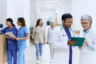 Arabic nurse assisting a patient at a Delhi hospital, providing culturally sensitive care for Arabic-speaking medical tourists