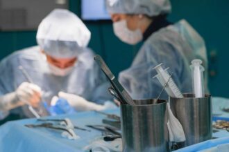 Expert surgeons performing surgery at Delhi Multi Surgery Hub with advanced medical equipment