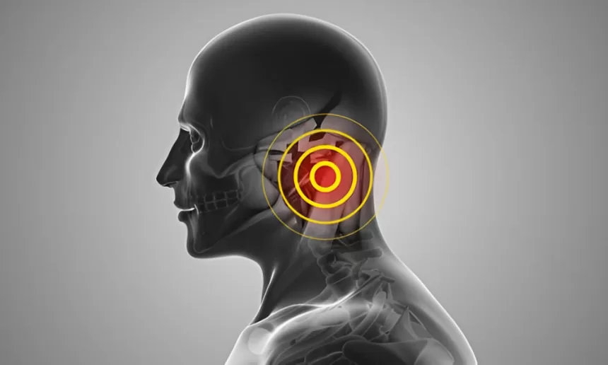 A man's head featuring a red target symbolizing focus on mastoidectomy surgery.