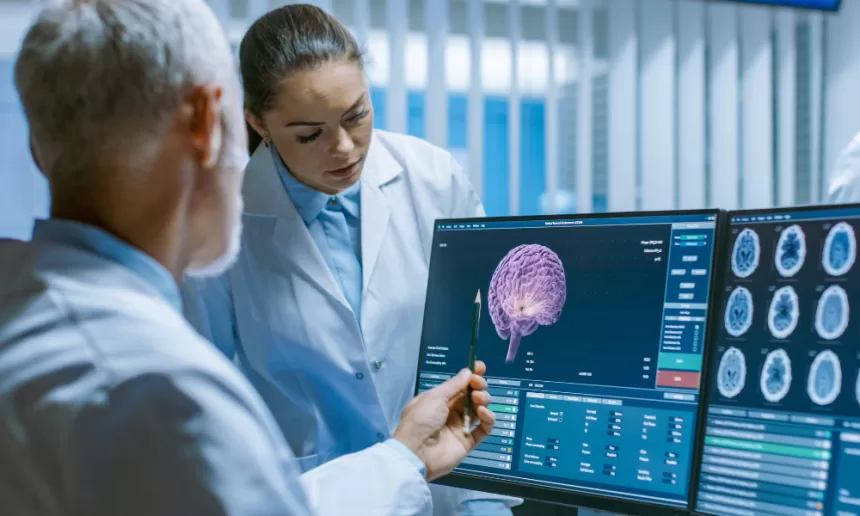 Surgeon performing functional neurosurgery to treat neurological disorders.